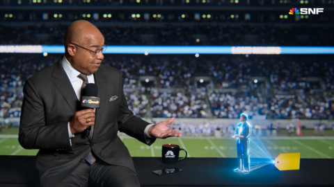 Best Buy hologram 'Gram' with NBC Sports host Mike Tirico.